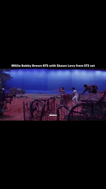 Millie Bobby Brown chilling bts with Shawn Levy, while the upside down waits its turn… movie magic, i guess.  #glamsham #milliebobbybrown #strangerthings5 #bts #filmmaking  {glamsham, millie bobby brown, stranger things 5, bts, film making}