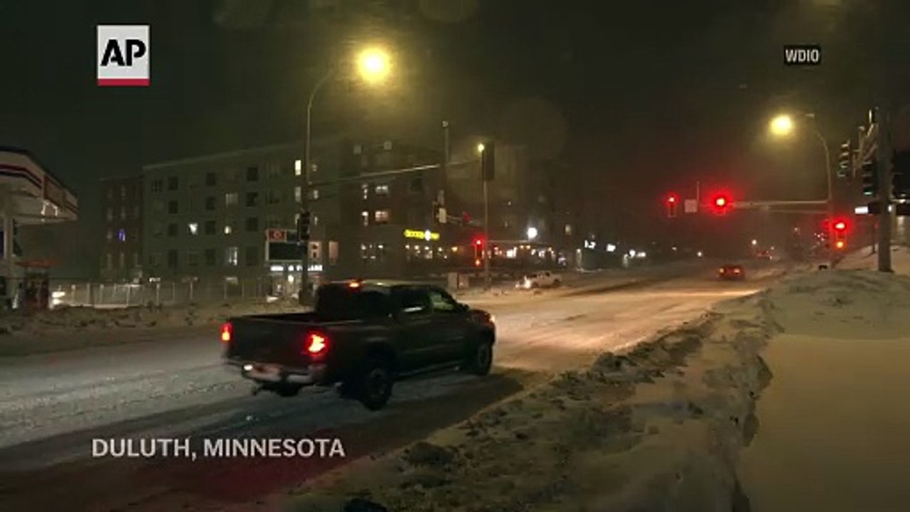 Winter storm brings blizzard conditions to Upper Midwest - video ...