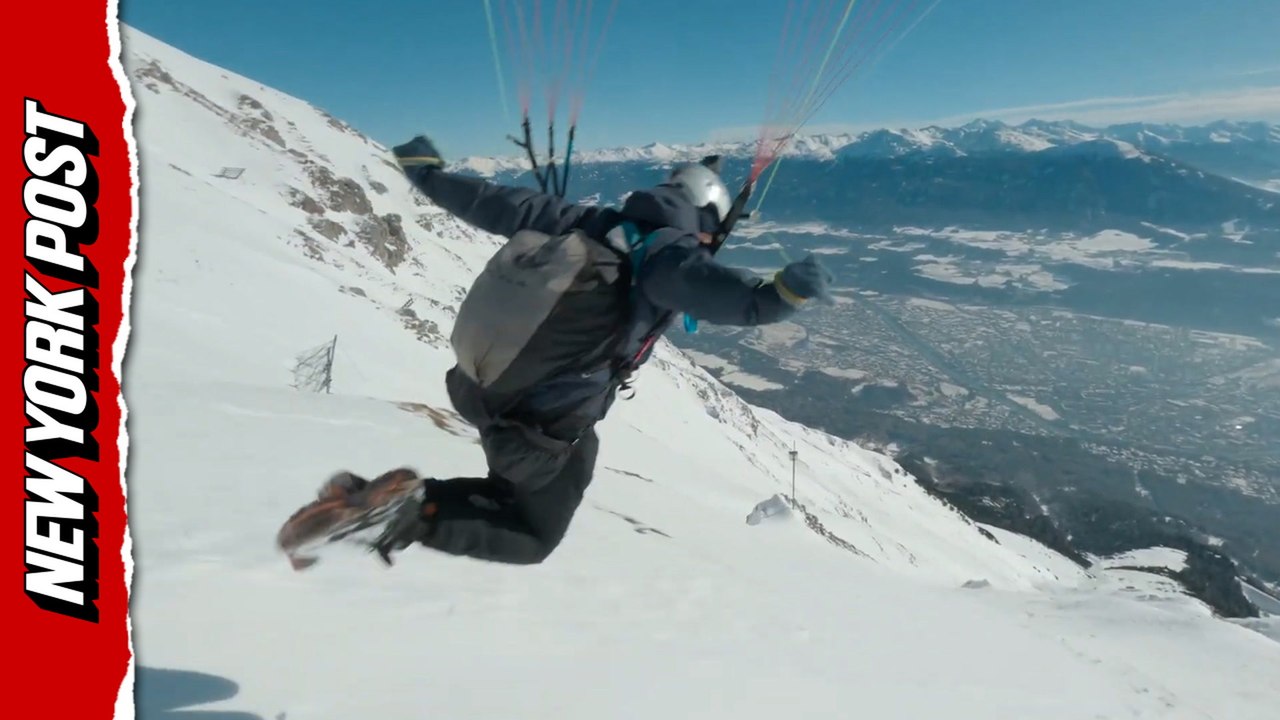Unbelievable drone footage captures speed-flyer racing down alpine mountains