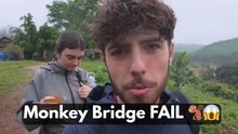 Boy falls into water from monkey bridge but crosses it on his last try