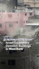 Israeli Excavators Demolish Buildings In West Bank