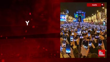 Paris'te yeni yıl kutlamasında dikkat çeken anlar