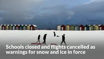 Schools closed and flights cancelled as warnings for snow and ice in force