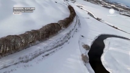 Heavy snow shuts schools, disrupts rail travel across northern Scotland