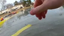 Dramatic video shows rescue of eight-year-old who fell through frozen pond on Christmas Day