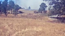 A grass fire at a Jindera property, sparked by a lawnmower