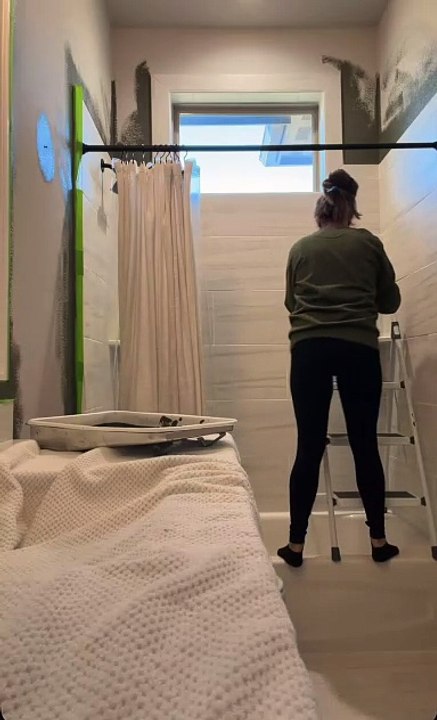 She just wanted to paint her bathroom window
