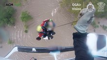 Helicopter rescues man trapped in floodwaters in Cairns
