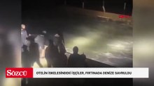 Otelin iskelesinde onarım yapan işçiler, fırtınada denize savruldu