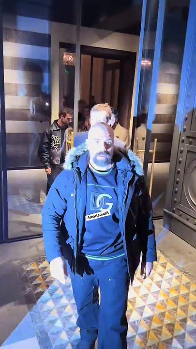 Dua Lipa and Callum Turner leave the hotel costes in Paris