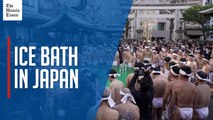 Japanese take plunge in Tokyo shrine's ice bath to pray for New Year