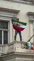 Iranian flag ripped down during protest at London embassy