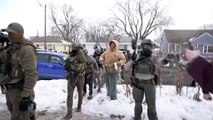 Federal agents make arrest in Minneapolis as protesters surround them