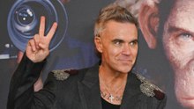 Robbie Williams admits he 'gave up' trying to 'crack' America