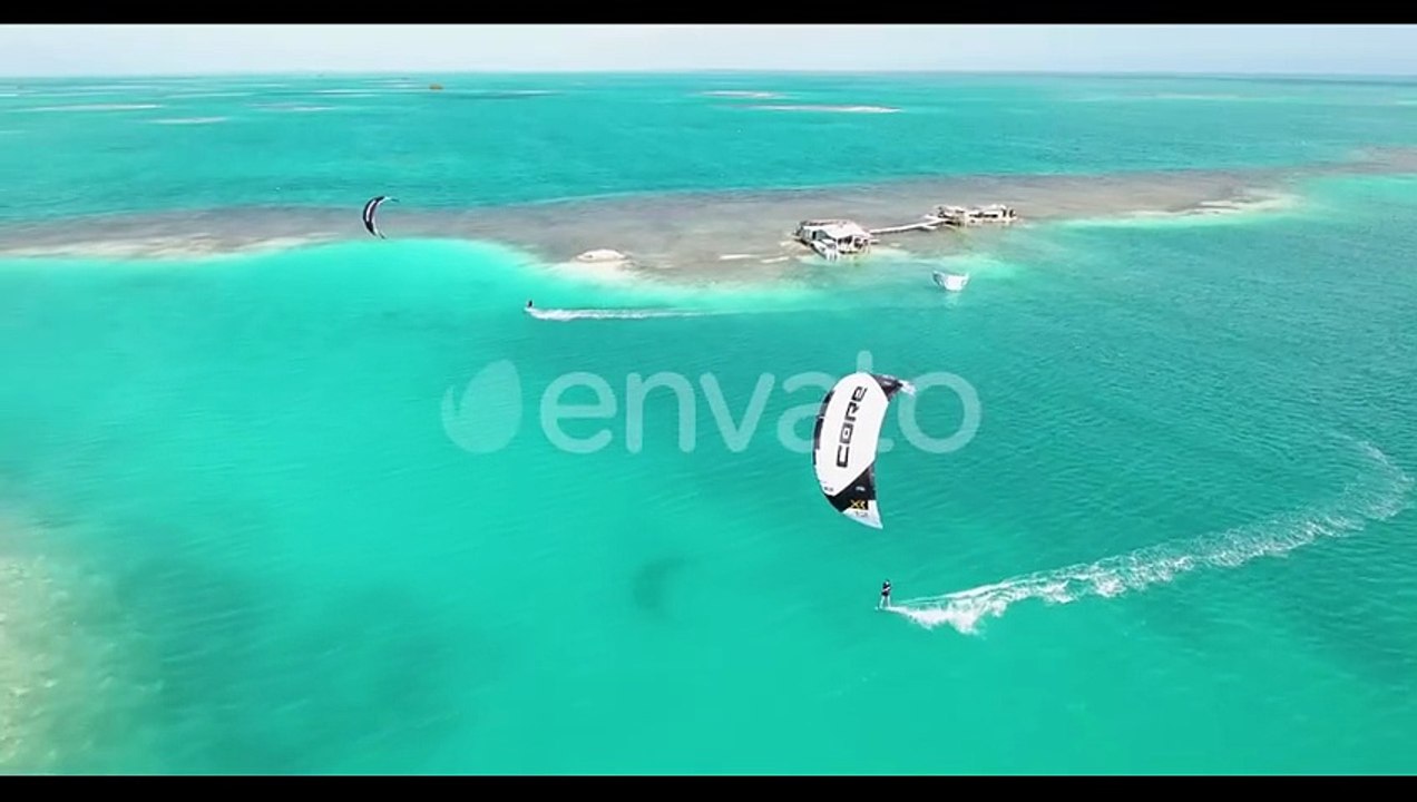 Kitesurfing and Windsurfing on Tropical Island Aerial View