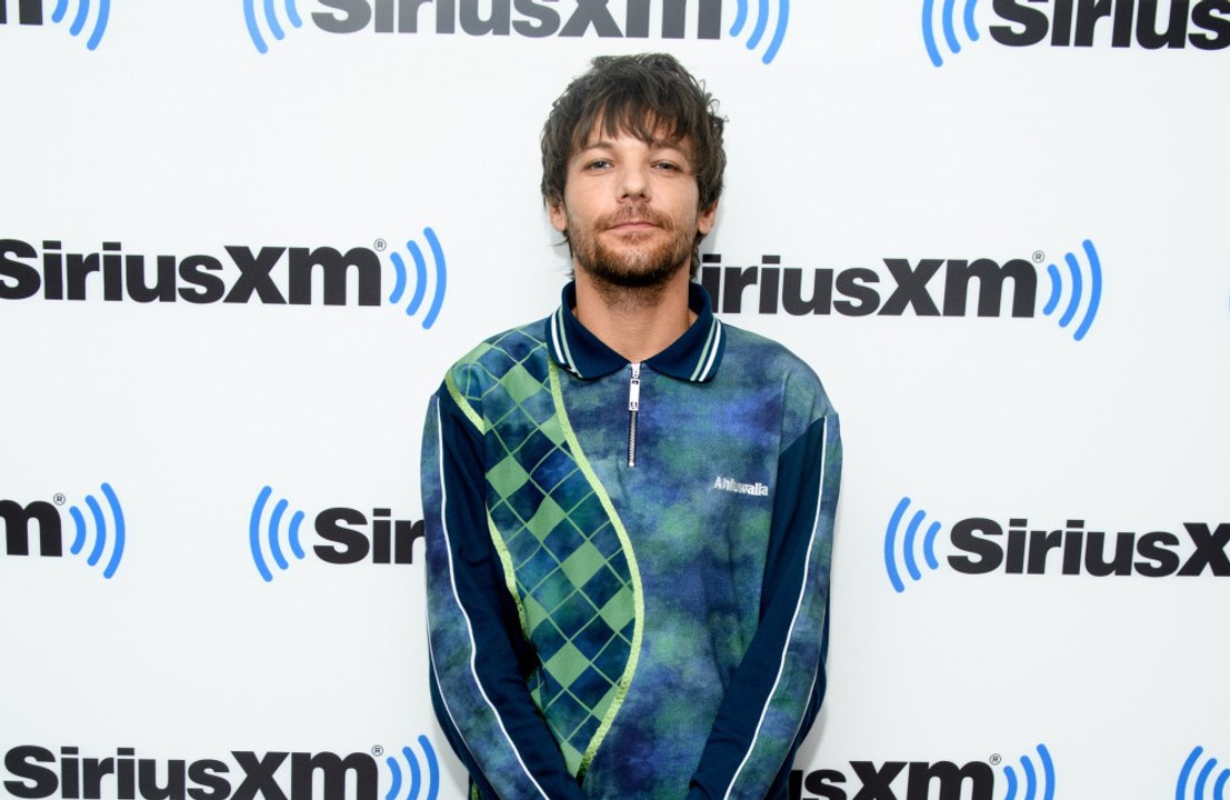 Louis Tomlinson feels too old to sing some of One Direction's songs