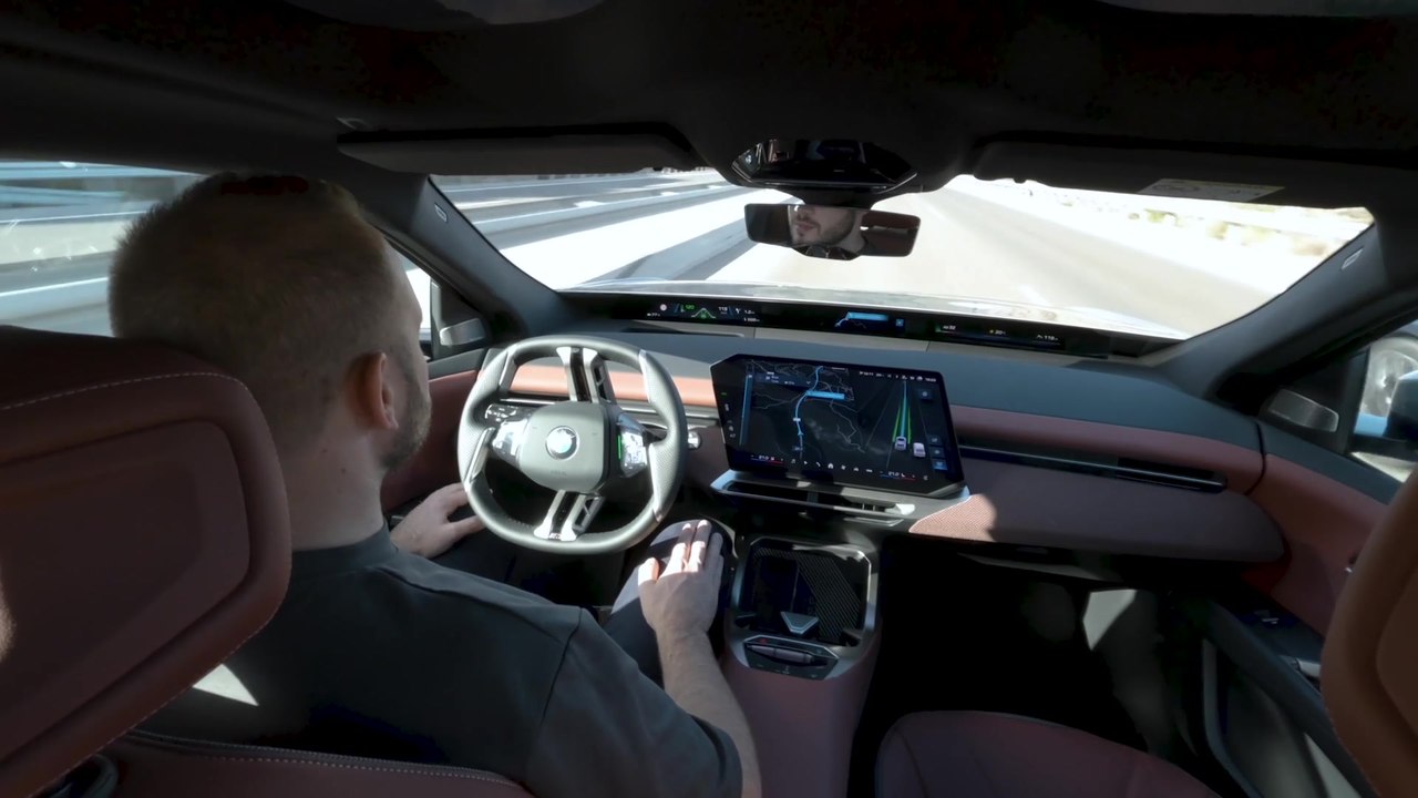 The new BMW iX3 50 xDrive. Polarized Grey Metallic. Navigation-guided exit function and Symbiotic braking and steering