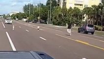 Heart-stopping moment hero rescues toddlers from middle of Florida street