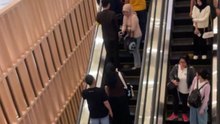 Momentary chaos erupts as witness tries to strike a thief but ends up falling instead in a mall
