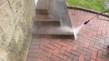 Layers of dirt disappear as grimy steps get a satisfying power wash