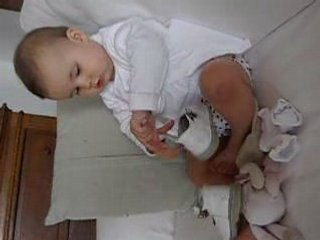 Que fais-tu?  Je mets mes chaussures