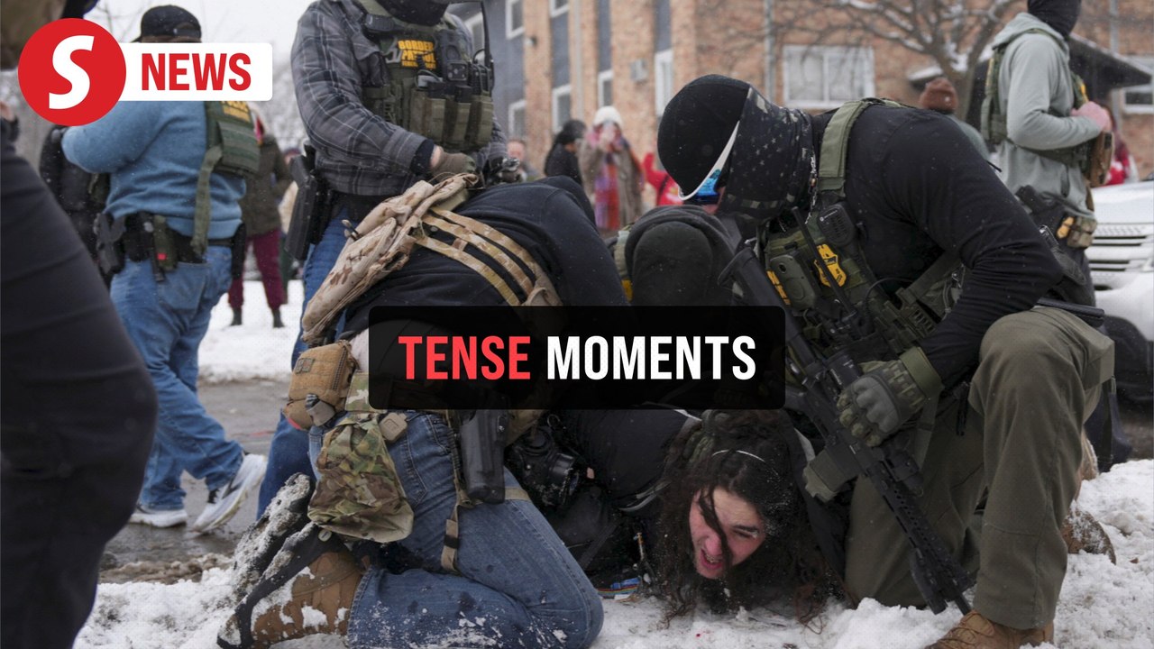 Gas stop turns tense as demonstrators confront ICE agents in Minneapolis