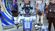 Robots parade through the streets of Davos