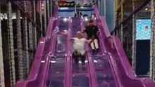 Grandad filled with instant regret after going down a slide with grandson