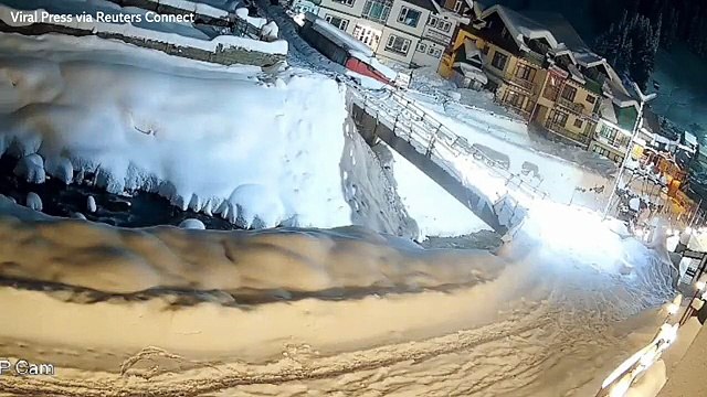 Terrifying moment avalanche engulfs homes during severe snow in northern India