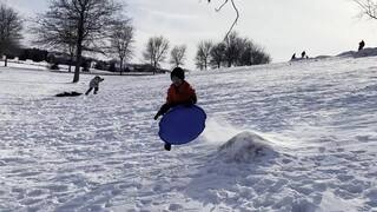Kid Falls Hard While Sledding