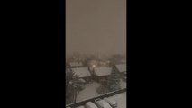 Heavy nighttime snowfall blankets neighborhood during blizzard in Hamilton, Ontario, Canada