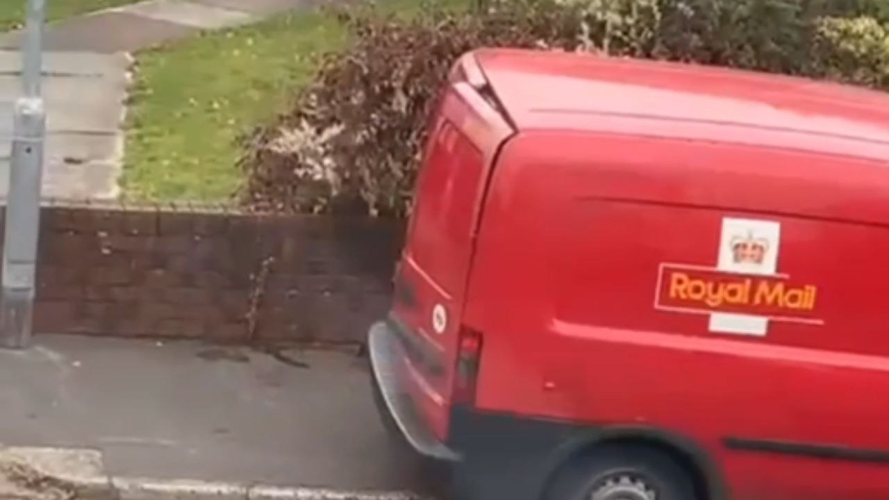Royal Mail worker gets stuck in van and struggles to escape before rescue