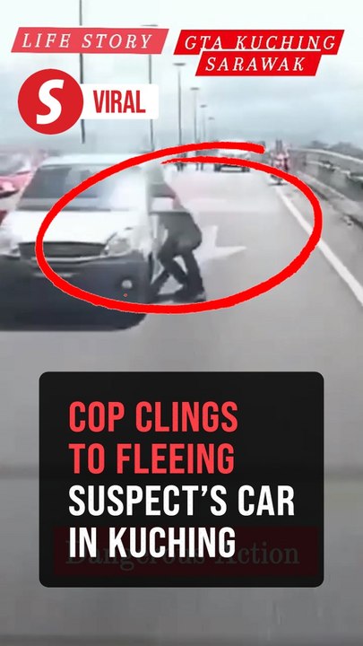 Like a movie stunt: Cop clings to suspect’s car in Kuching