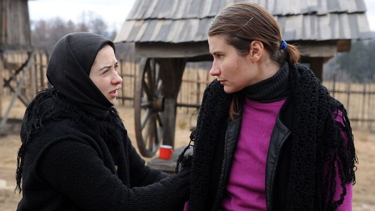 Au-delà des collines