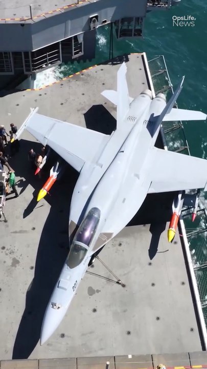 Inside the Aircraft Carrier Lift: Moving Fighter Jets with Precision