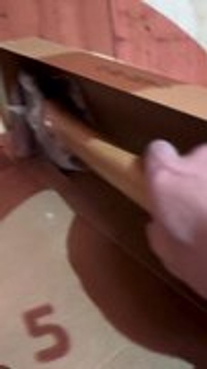 Man Throws Boxed Axe at Target