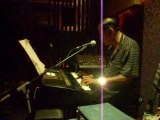 chinese man playing organ