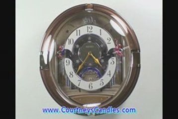 QXM211BRH Seiko Melodies in Motion Musical Clock