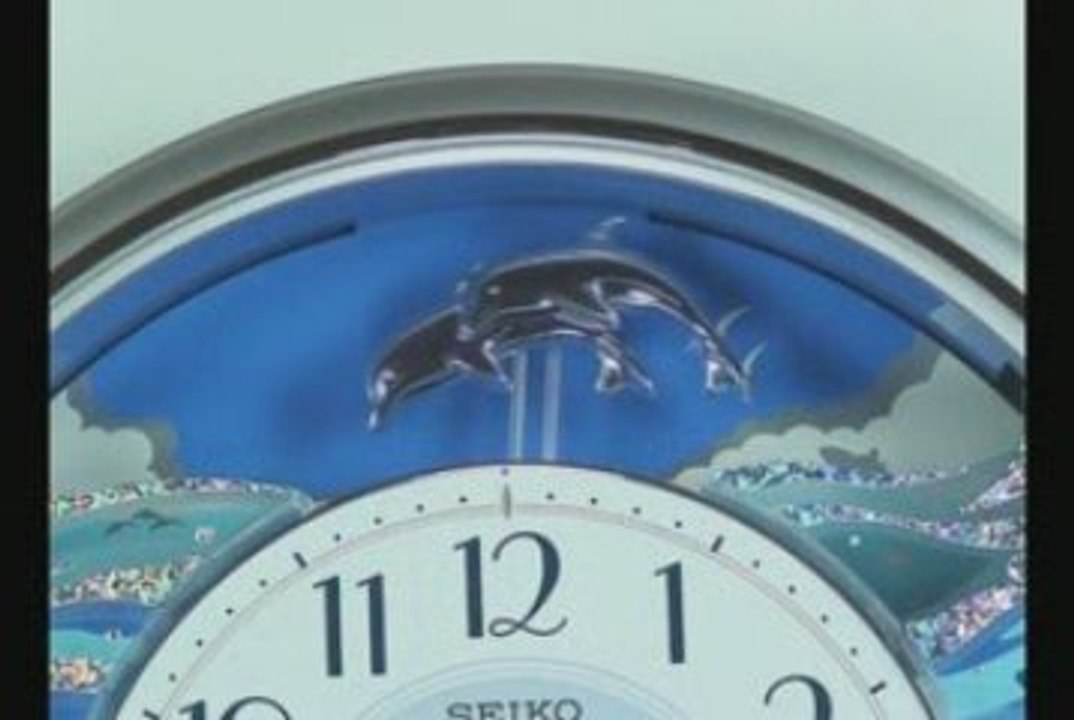 QXM208SRH SEIKO MELODIES IN MOTION MUSICAL CLOCK