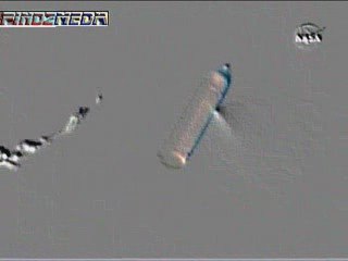 UFO EXITING WORMHOLE NASA STS 127 FUEL TANK Video