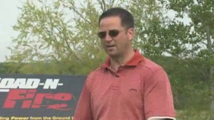 The Load-N-Fire Golf Training Aid