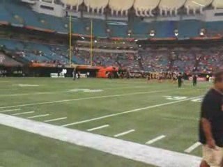 Sadie & Andrew (Blazin' Soccer Dogs) opening the BC Lions