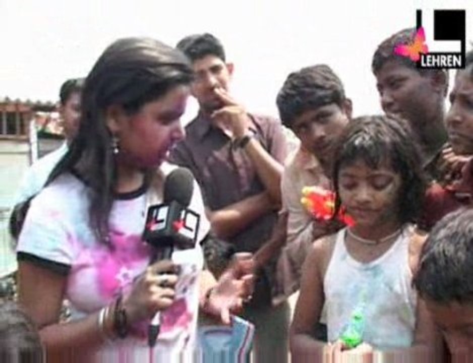 Rubina plays Holi for the first time.