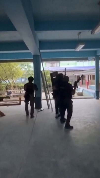 Gunman arrested after taking hostages at Thai school