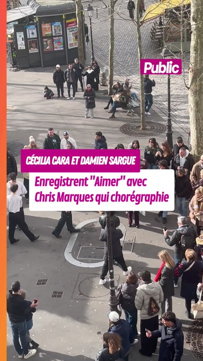 Cécilia Cara et Damien Sargue qui enregistrent "Aimer" sur la place des Abbesses avec Chris Marques en chorégraphe