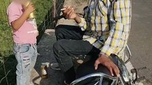 Man offers energy drink and cigarette to minor