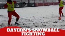 Bayern Munich players engage in snowball fights during a very cold training