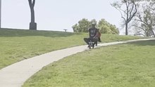 Hilarious park moment as kid trips while running behind his bike