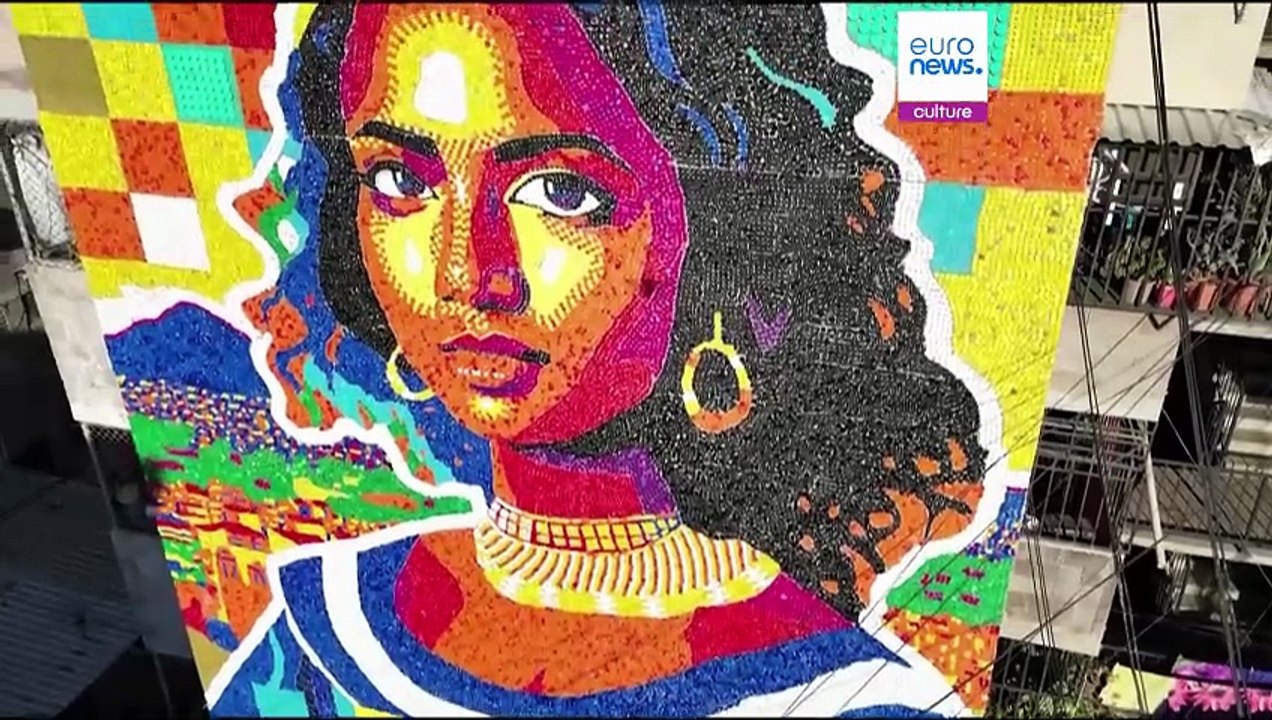 Mona Lisa aus Plastikmüll: Größtes recyceltes Wandgemälde der Welt aus 100.000 Deckeln in El Salvador