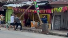 Parade Pole Tips And Comes Down In The Street During Parada De La Humisha